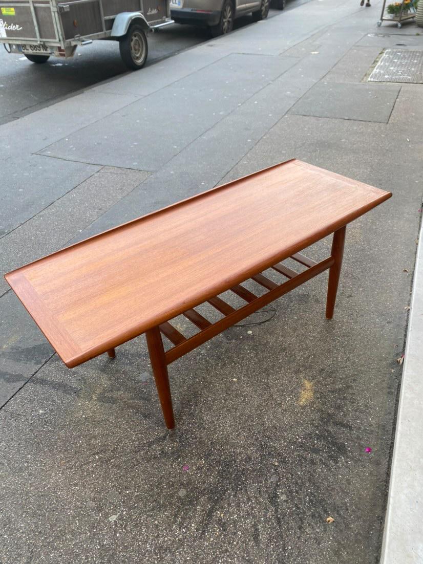Table basse scandinave en teck design de Grete Jalk