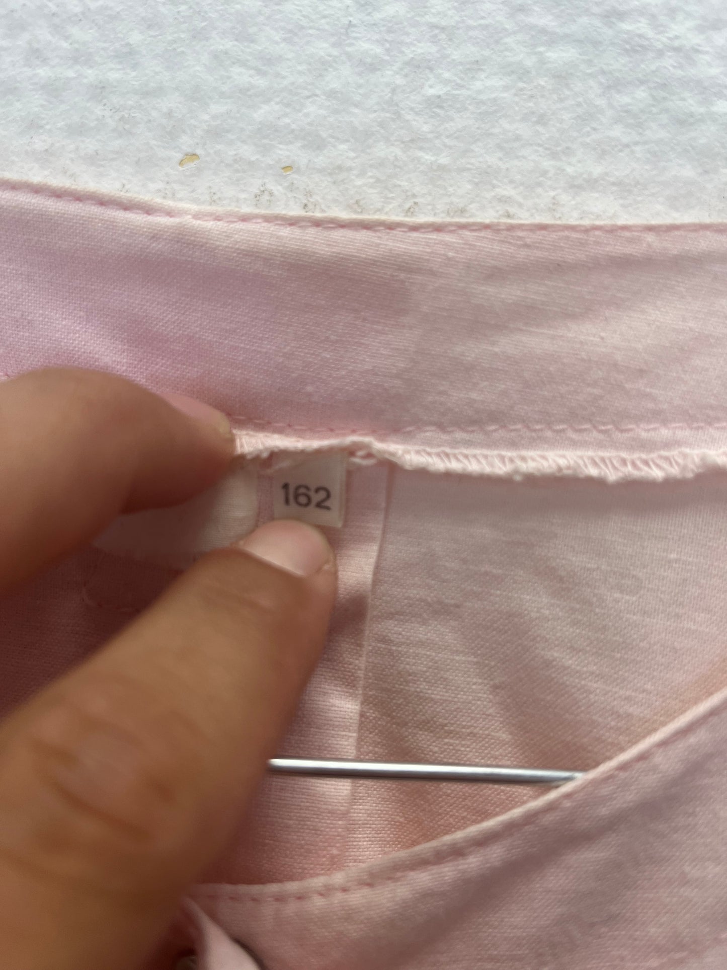Salopette rose pâle