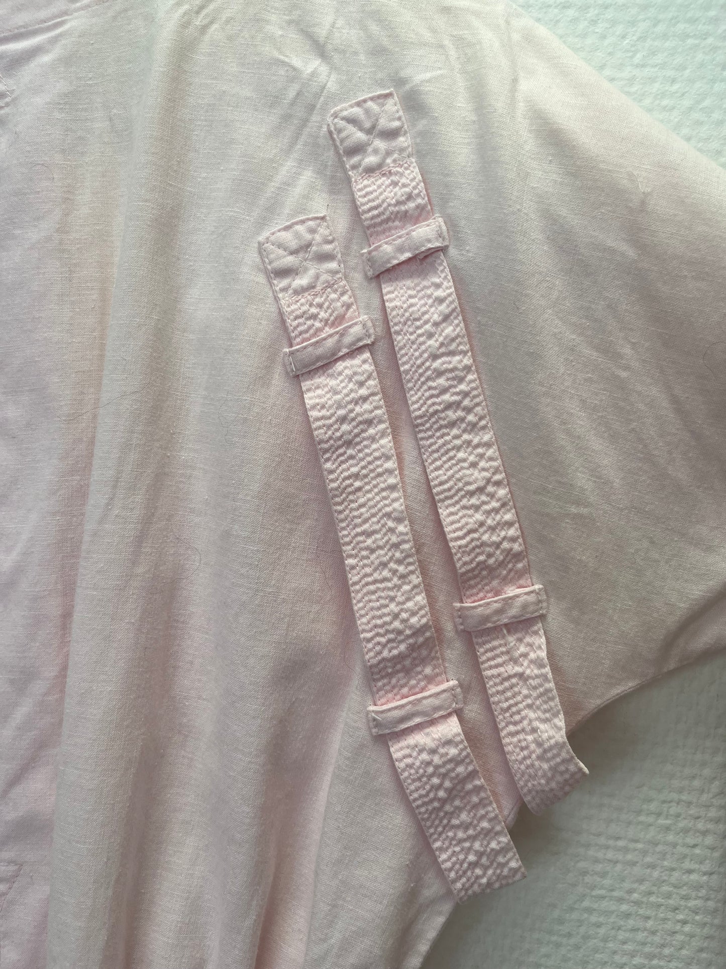 Salopette rose pâle