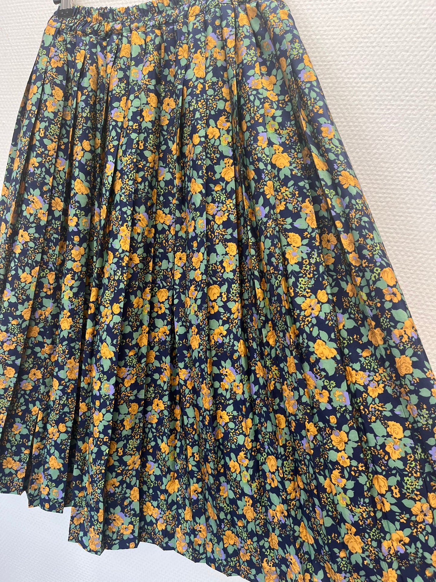 Jupe plissée à fleurs