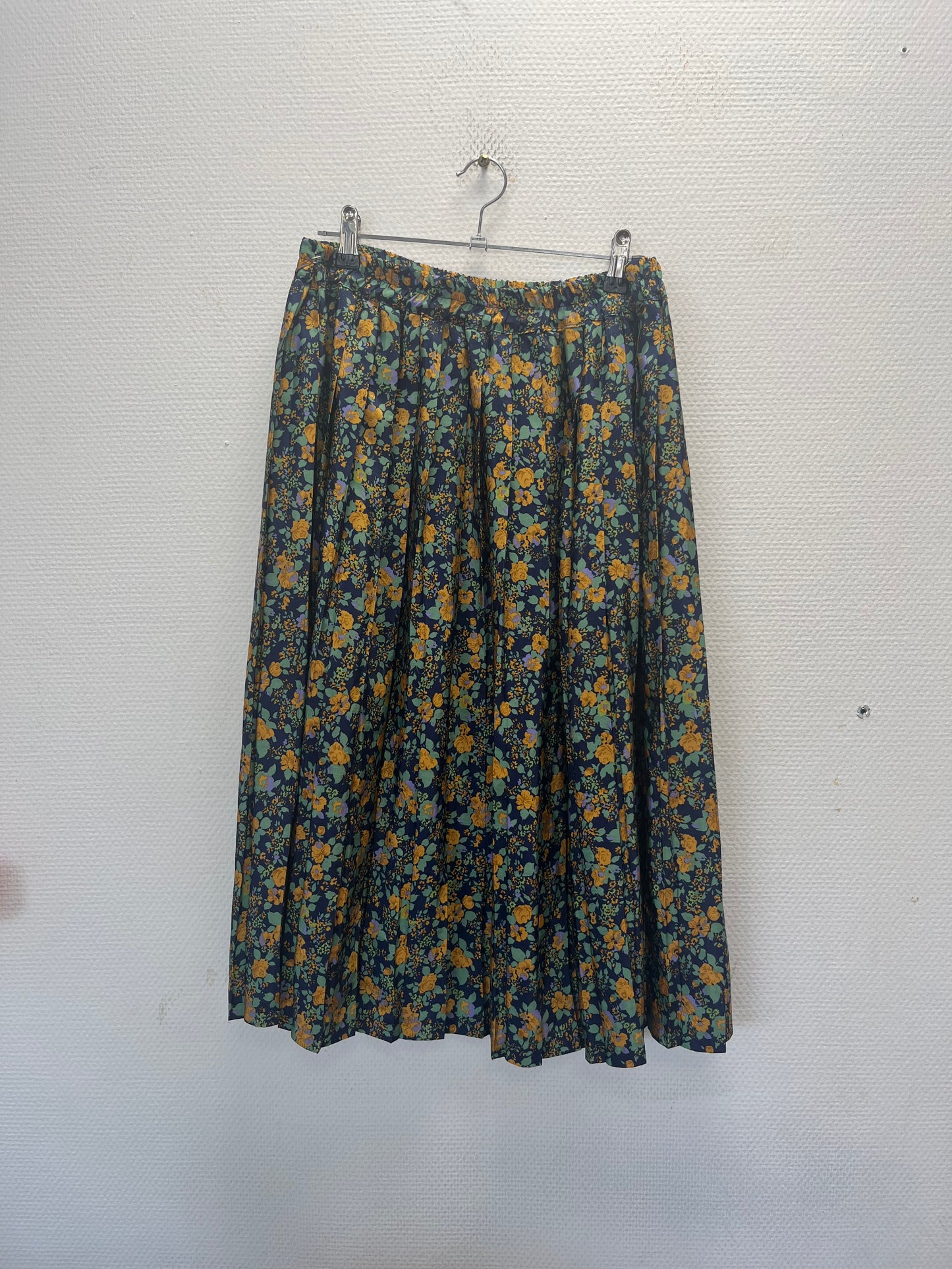 Jupe plissée à fleurs