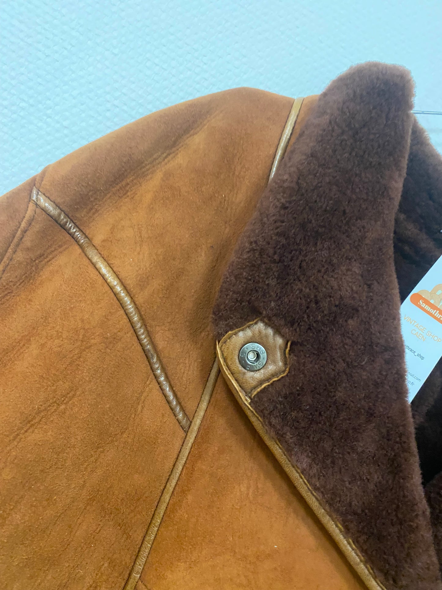 Manteau en peau lainée mi long
