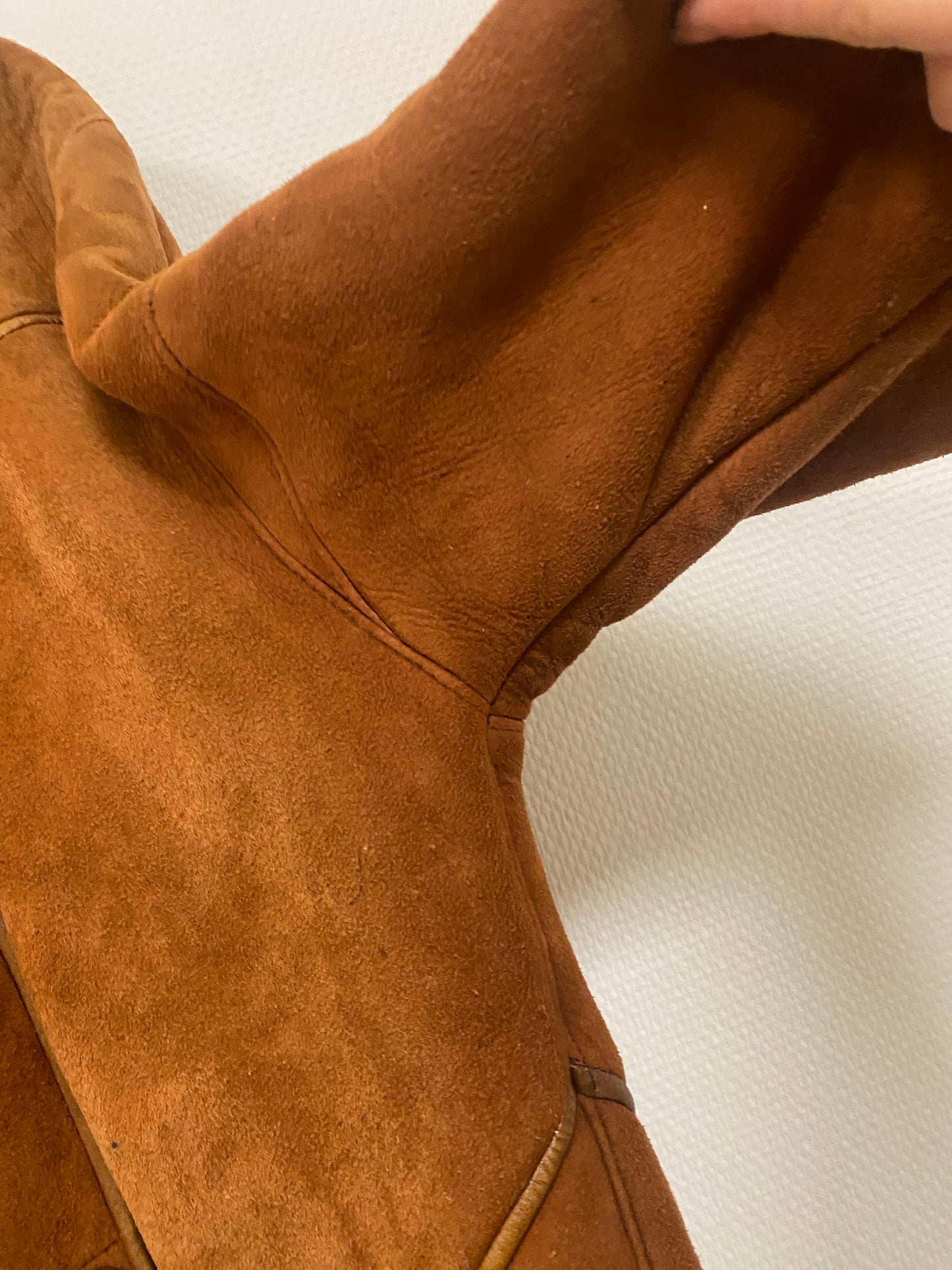 Manteau en peau lainée mi long