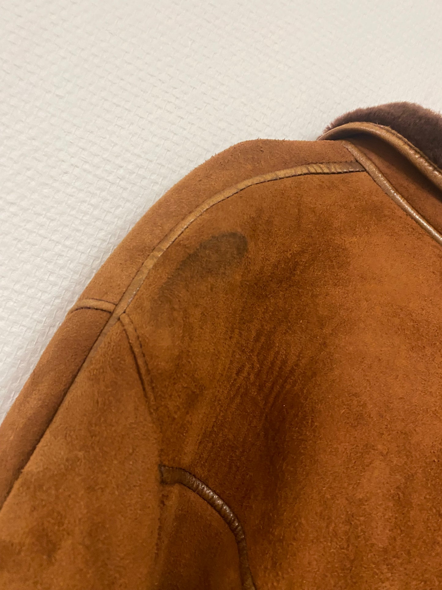 Manteau en peau lainée mi long