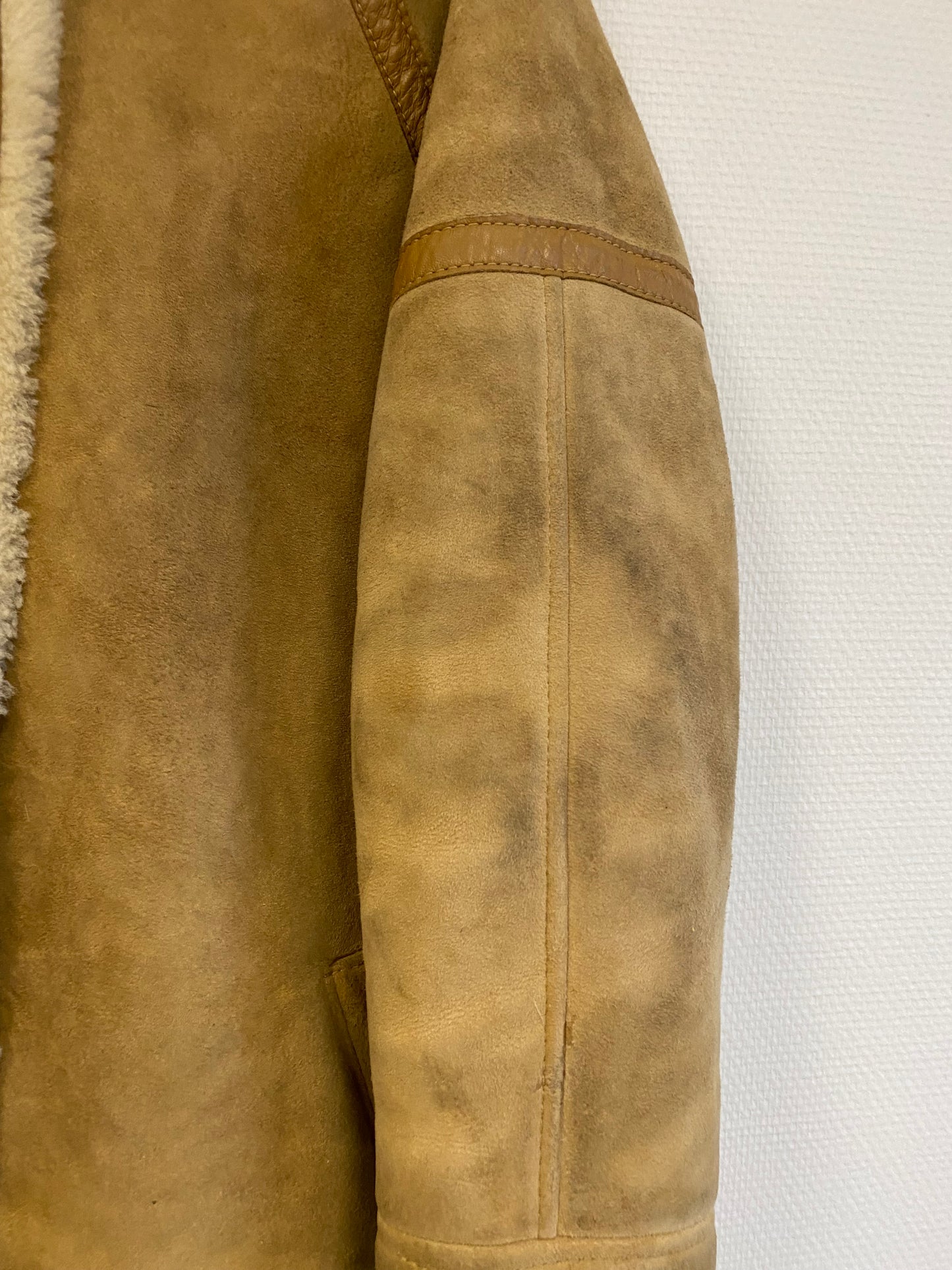 Manteau en peau lainée