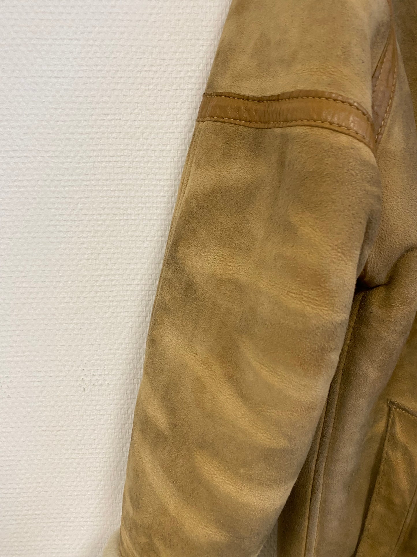 Manteau en peau lainée