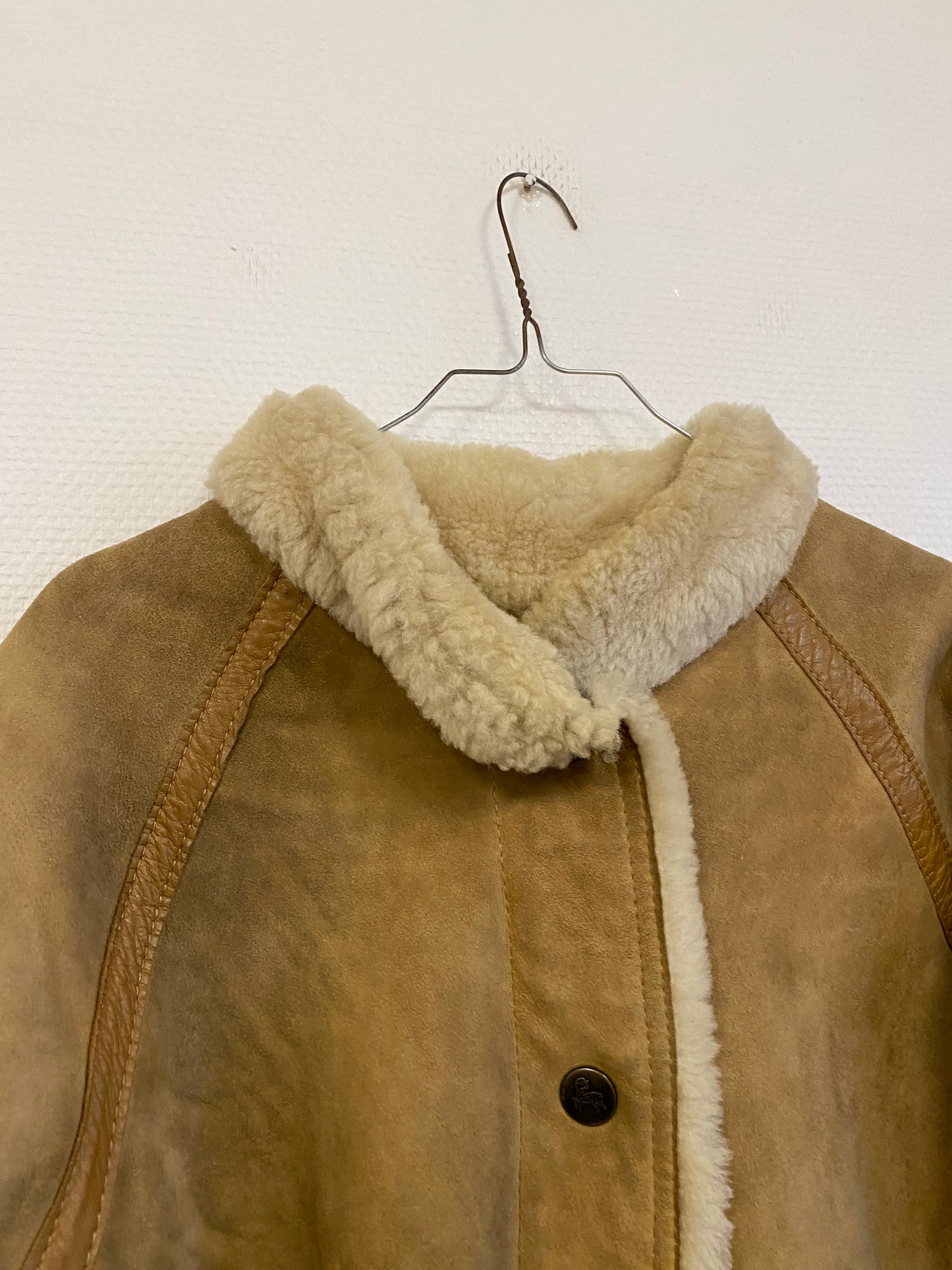 Manteau en peau lainée