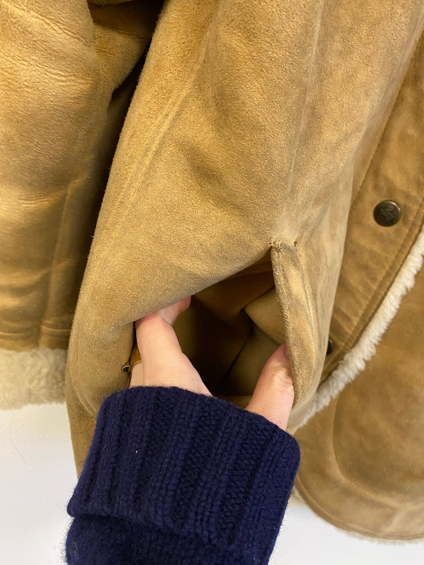 Manteau en peau lainée