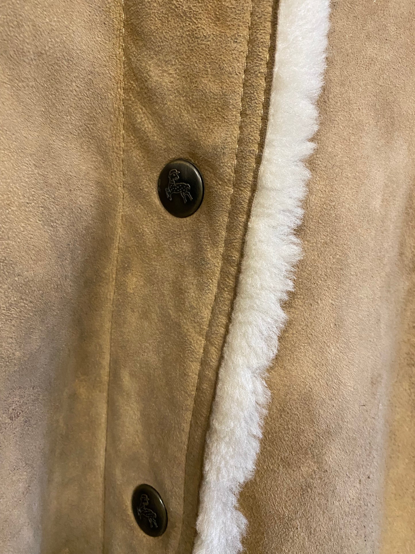 Manteau en peau lainée