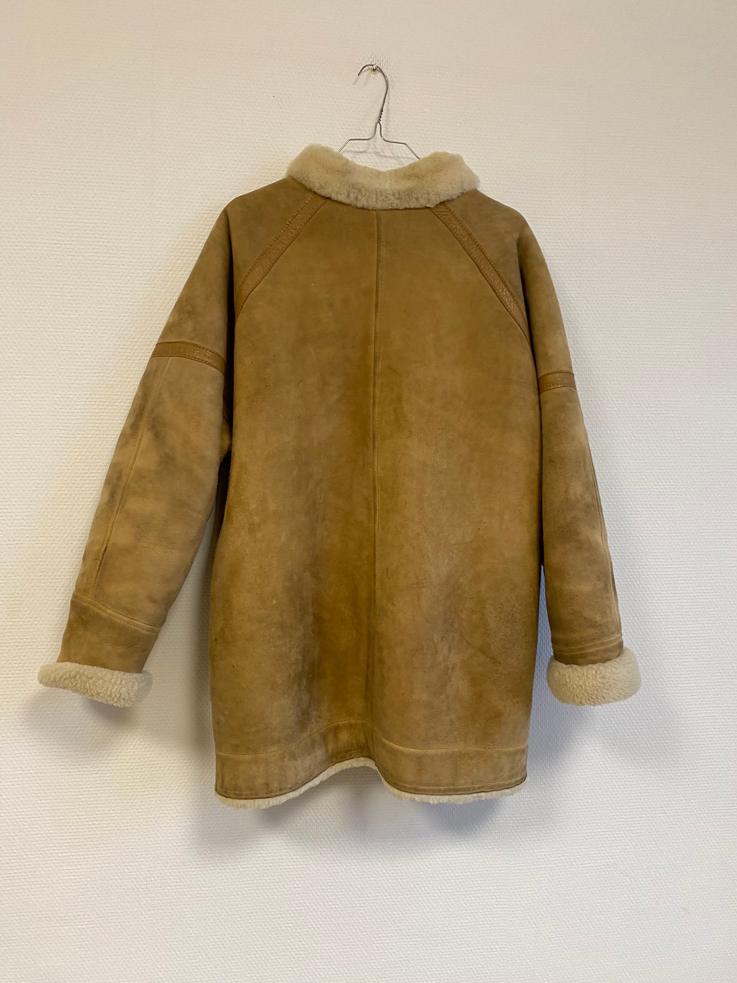 Manteau en peau lainée