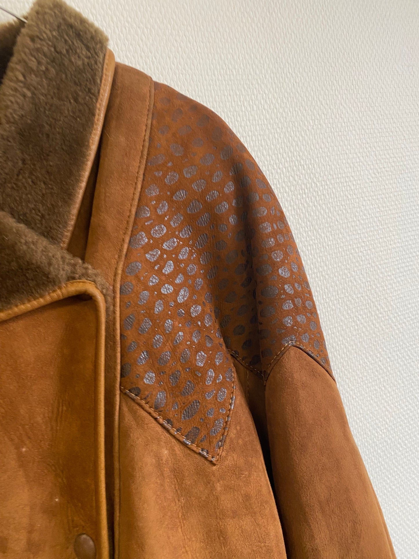 Manteau en peau lainée 80s