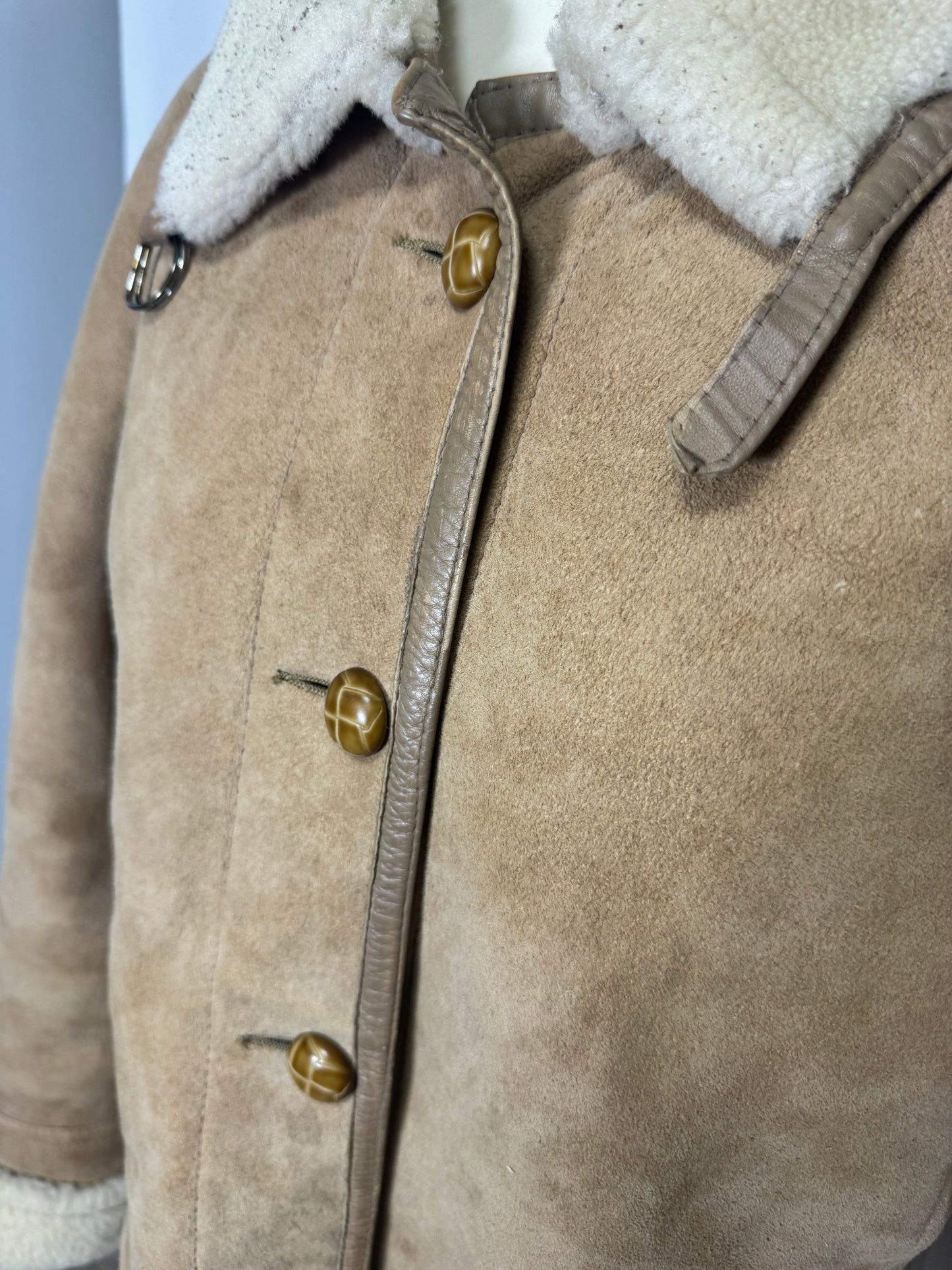 Manteau en peau lainée
