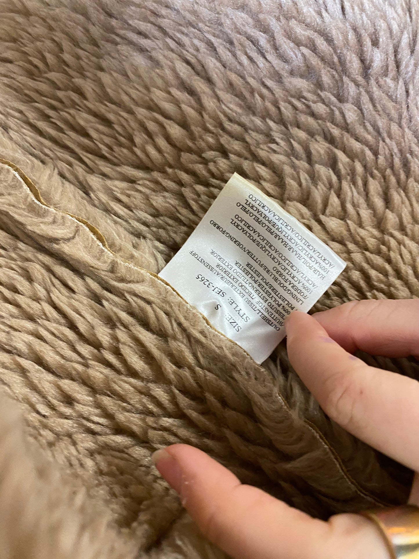 Manteau en peau lainée synthétique