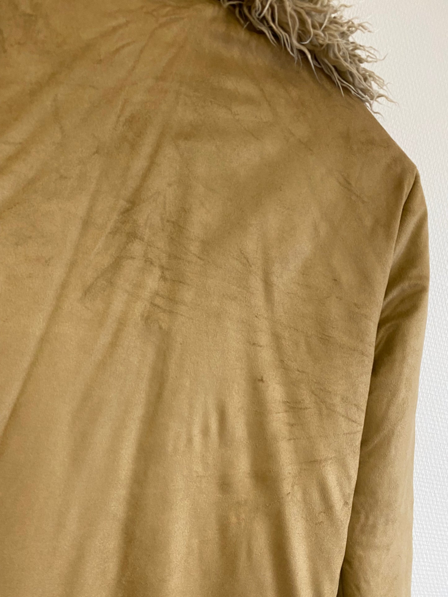 Manteau en peau lainée synthétique