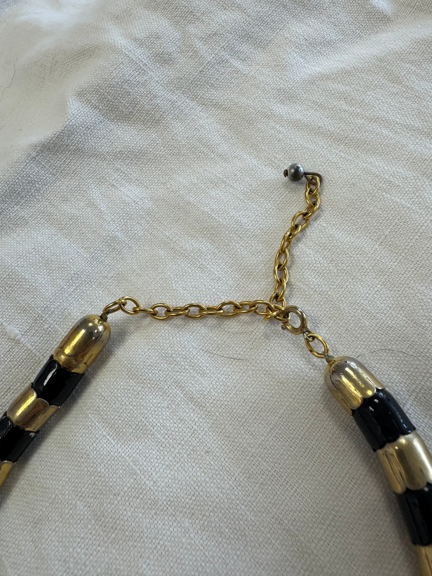 Collier noir et doré