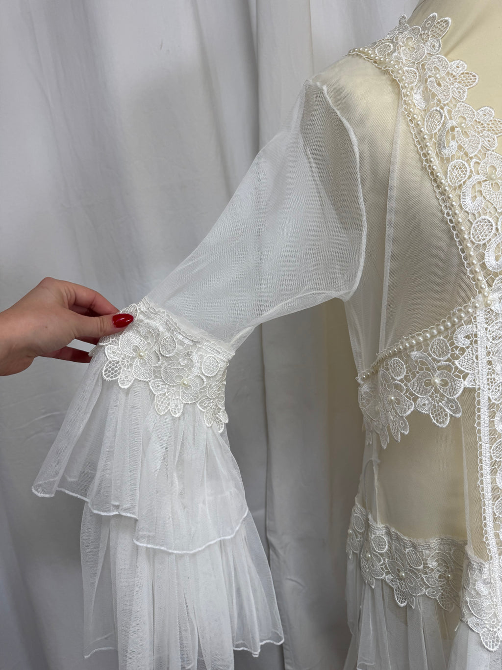 Veste longue en dentelle