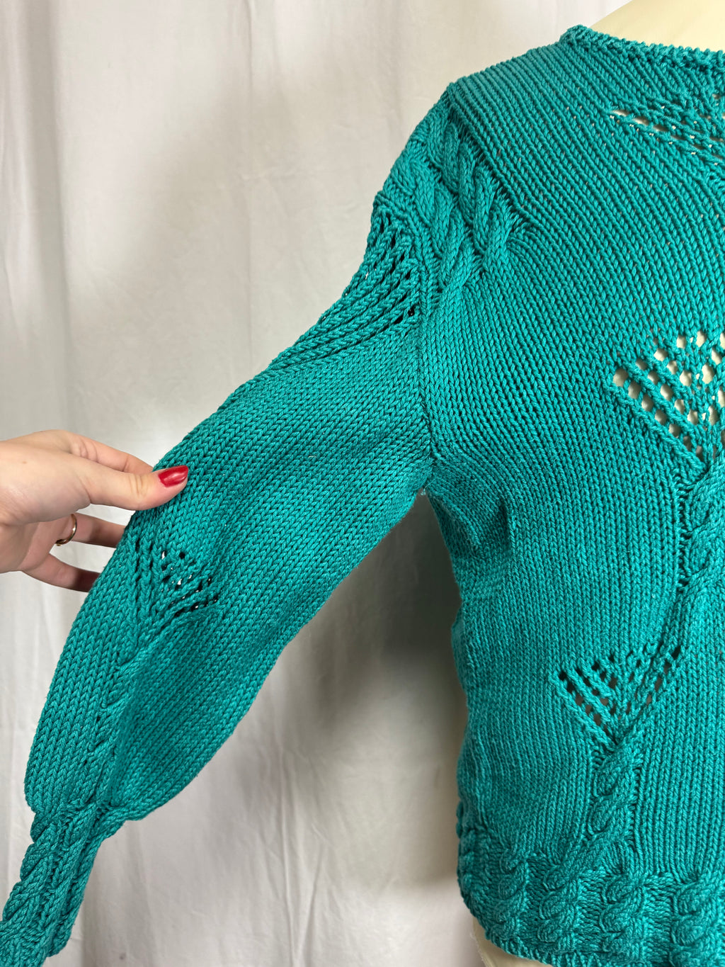 Pull ajourée vert