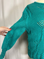 Pull ajourée vert