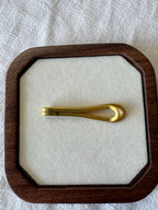 Pince à cravate doré