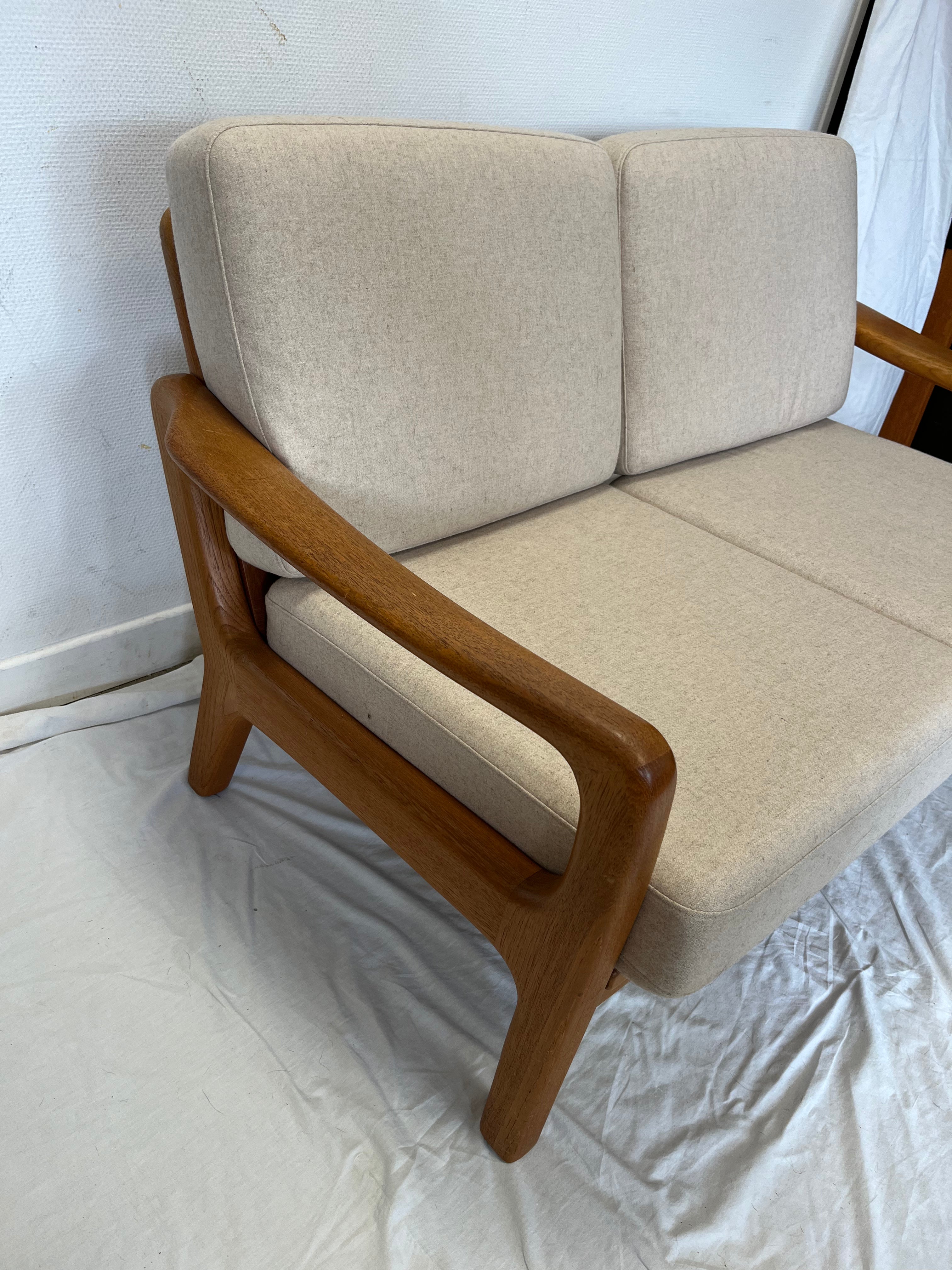 Canapé deux places convertible en teck massif 1970