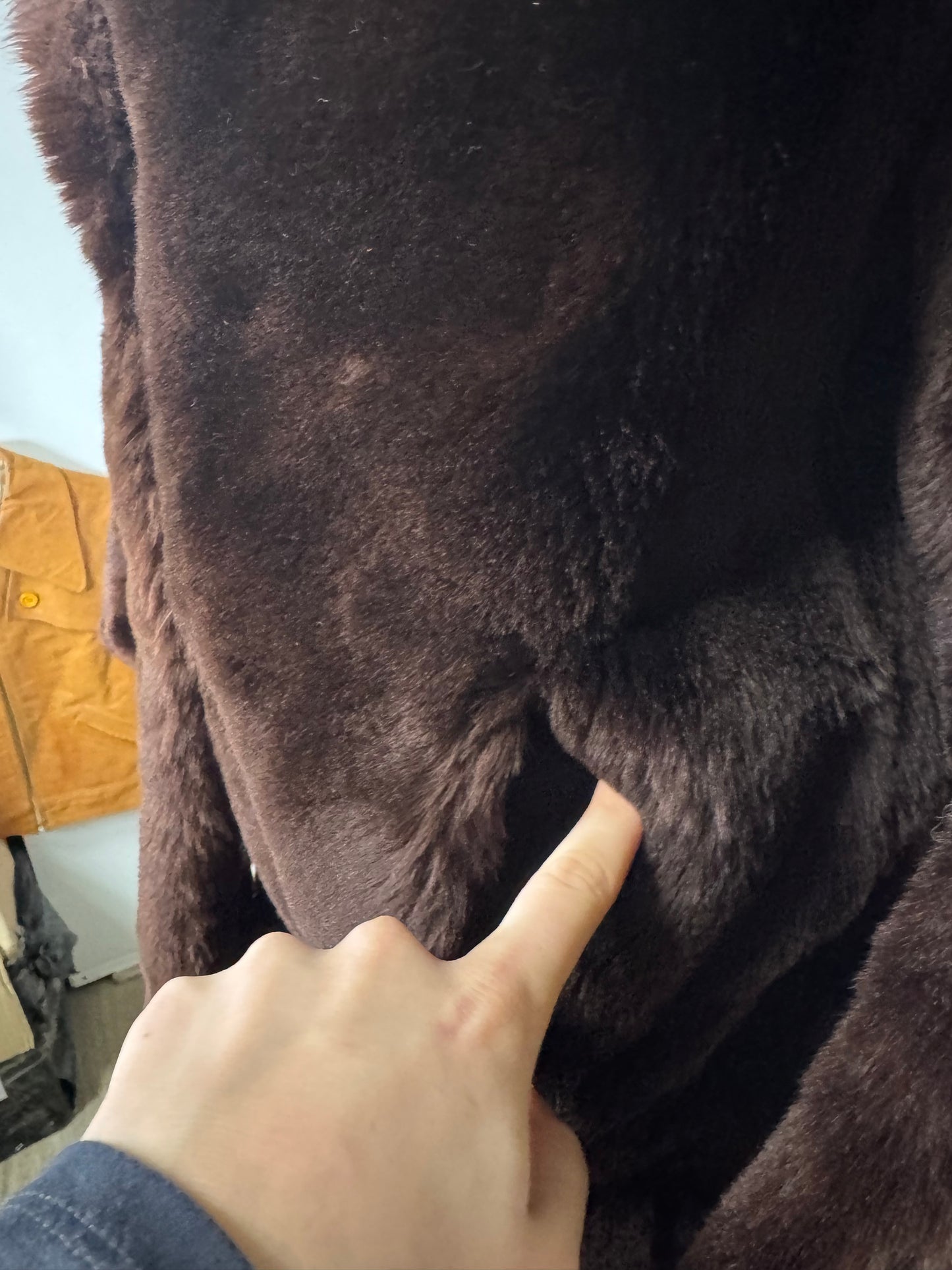 Manteau court fourrure de mouton