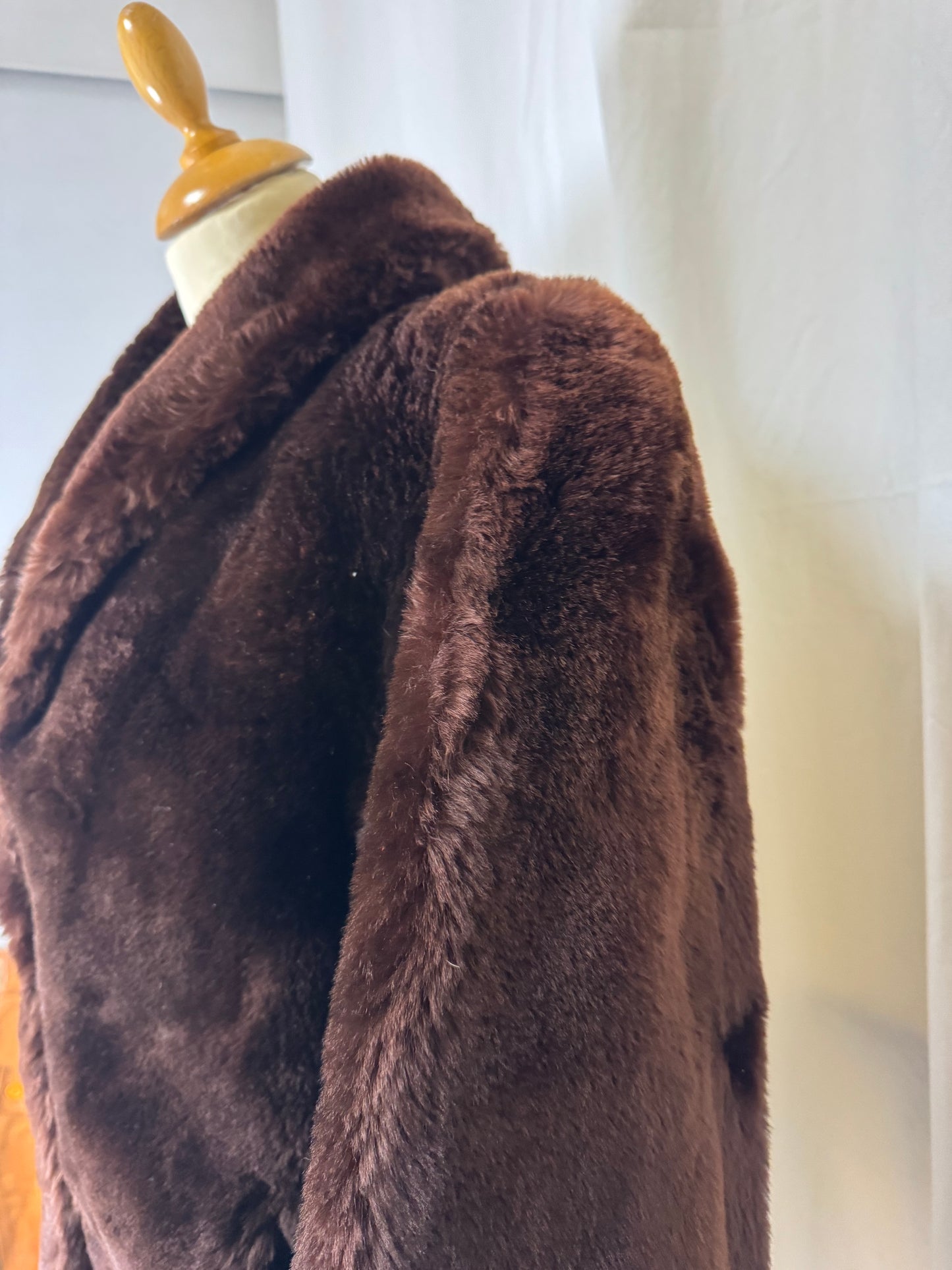 Manteau court fourrure de mouton