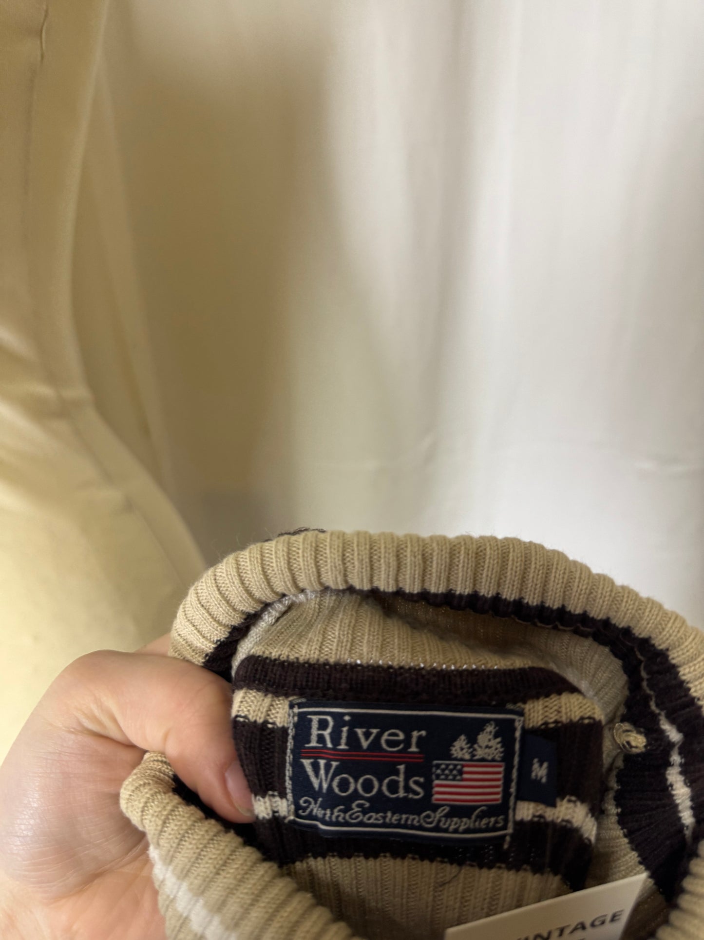 Pull col roulé à rayures