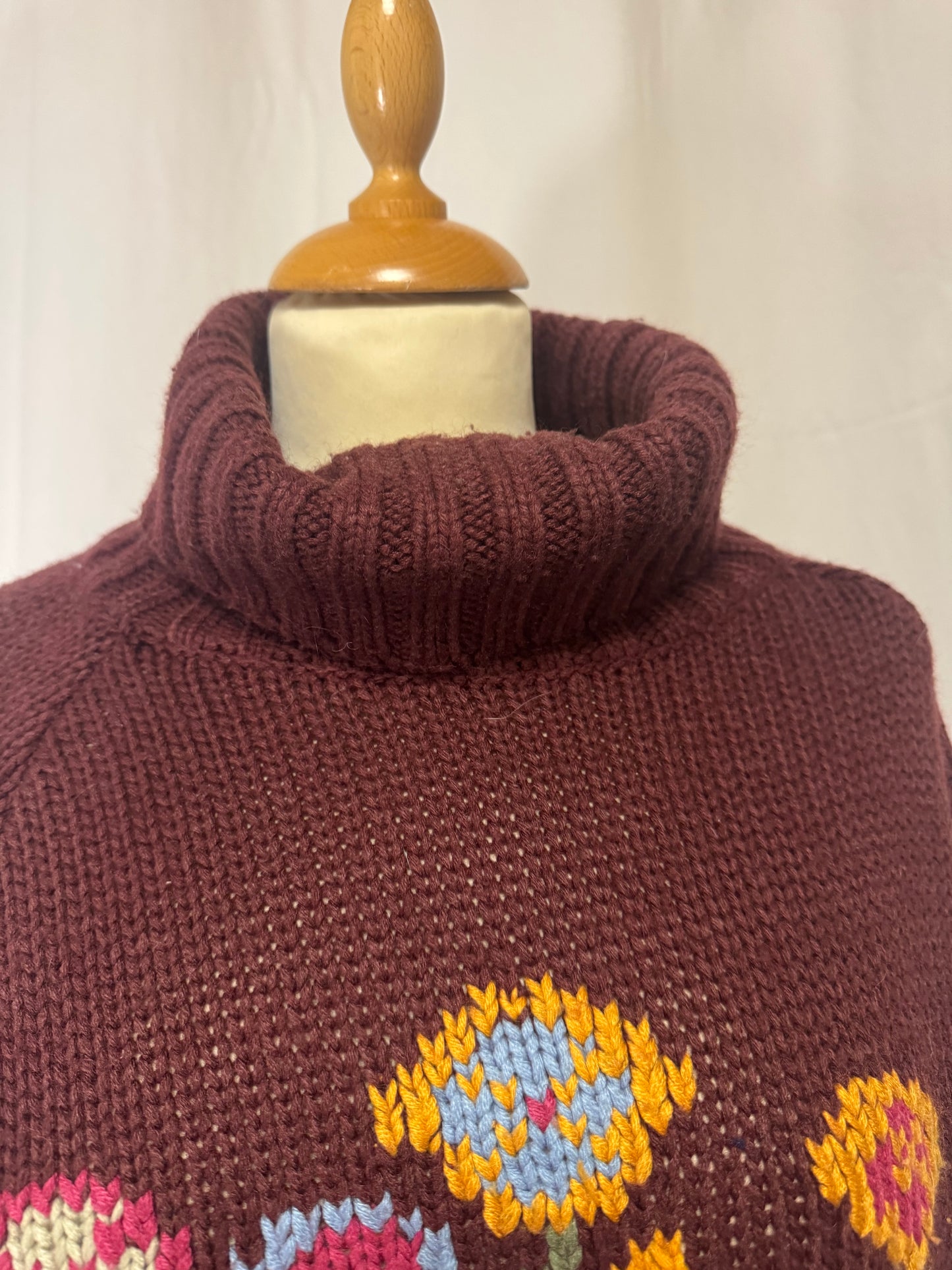 Pull col roulé à fleurs