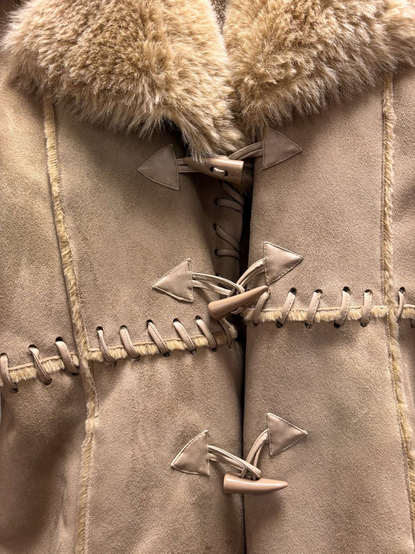 Manteau en peau lainée