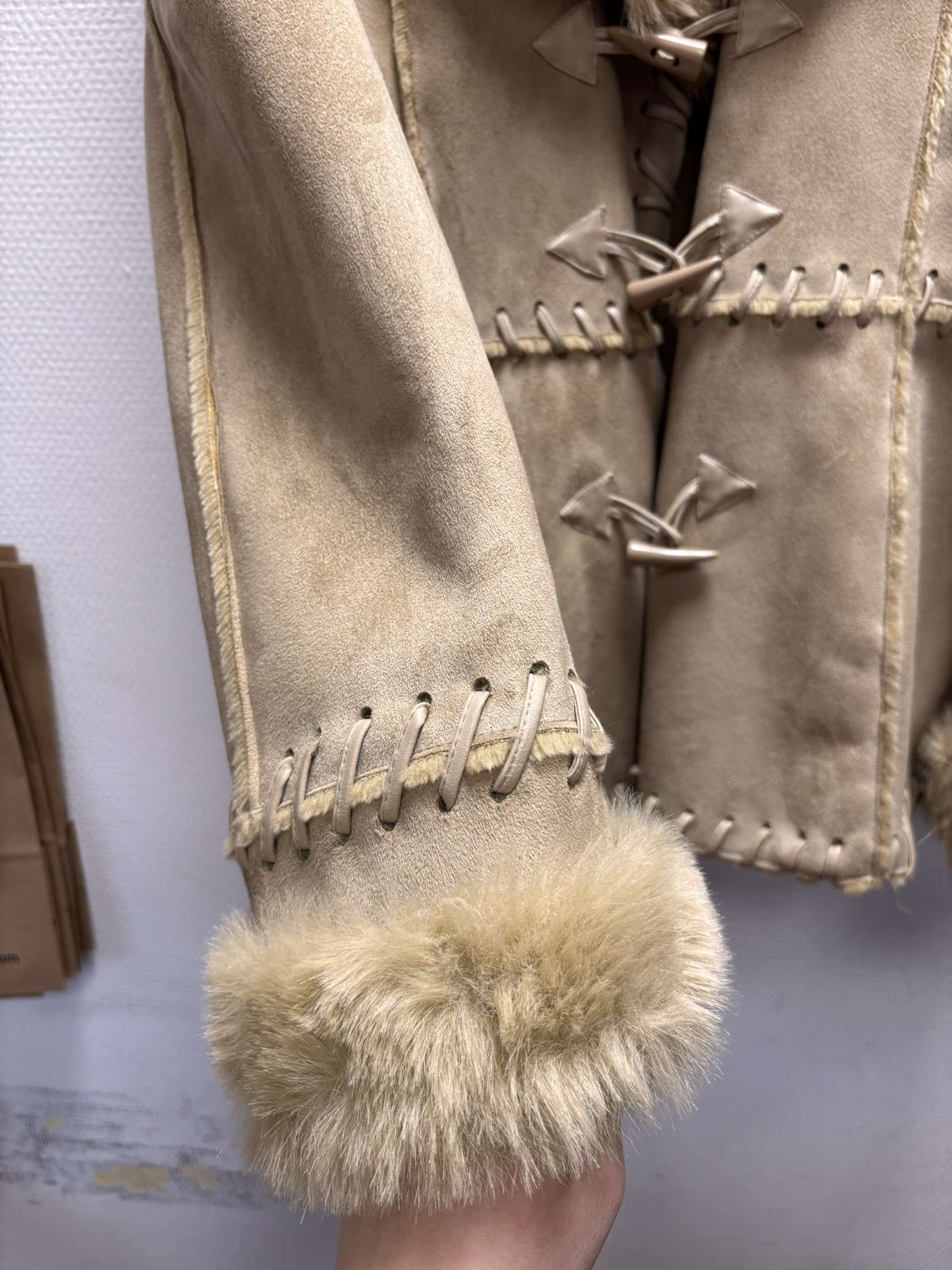 Manteau en peau lainée