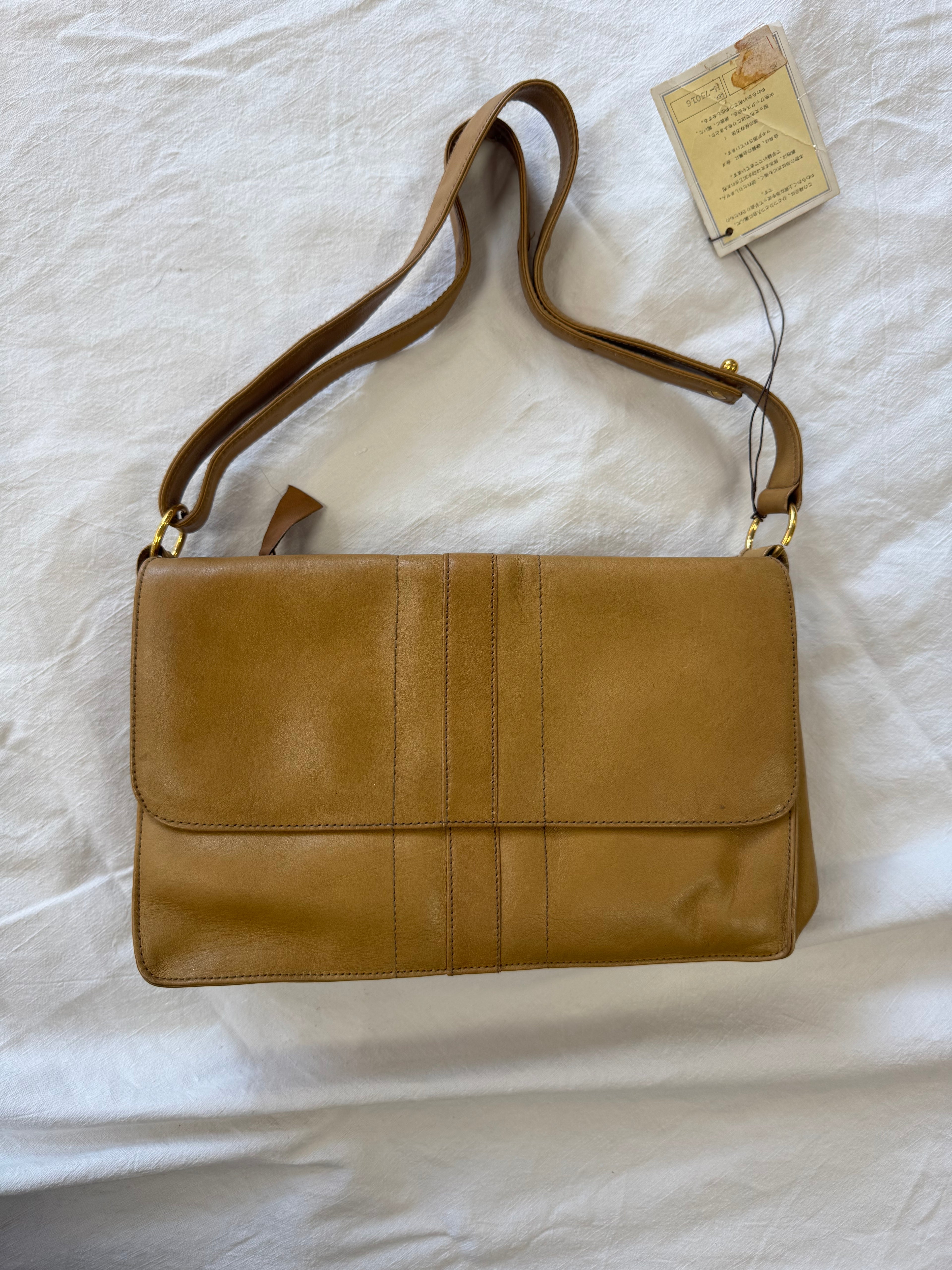 Sac baguette en cuir beige Nina Ricci
