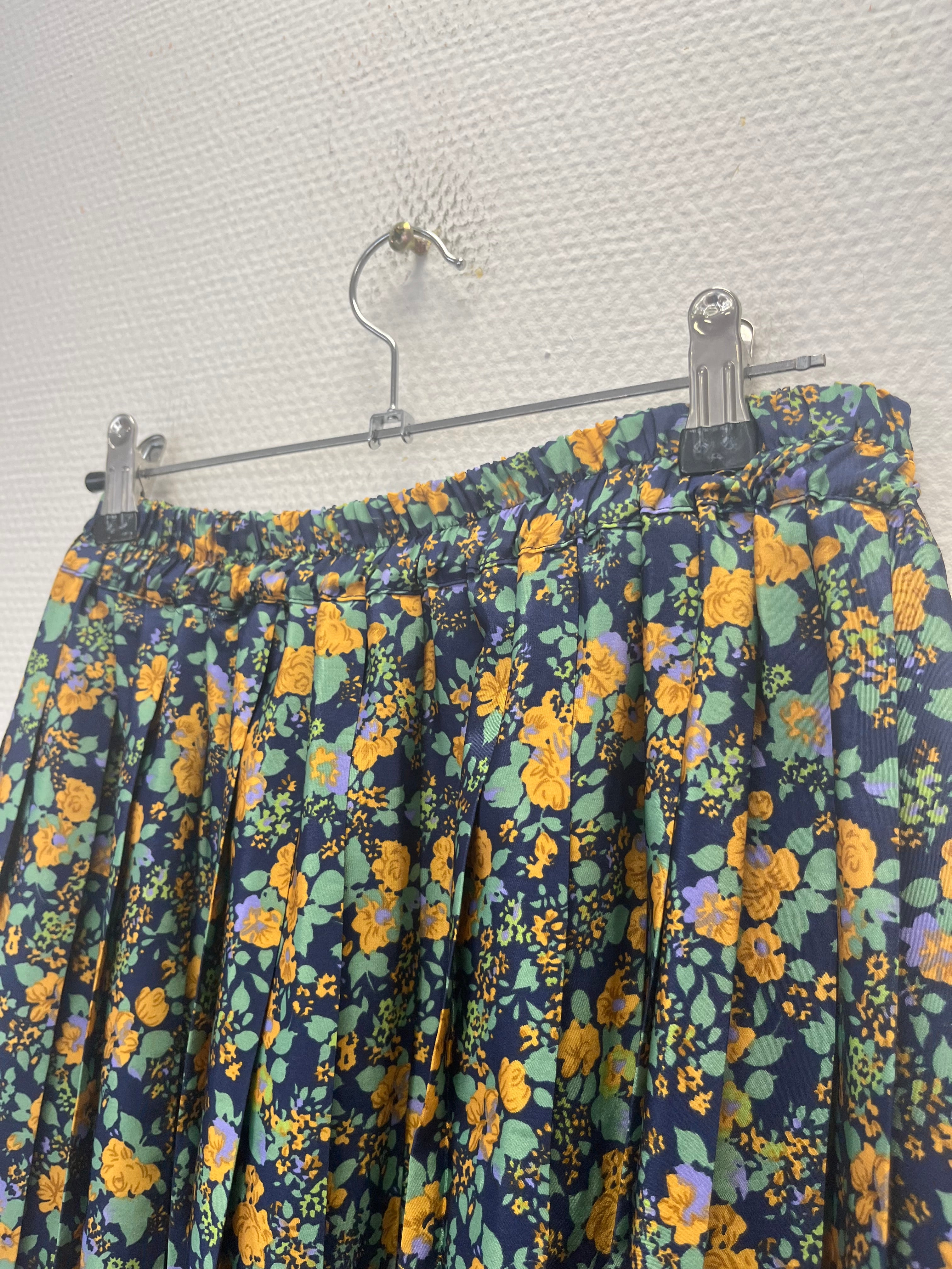 Jupe plissée à fleurs