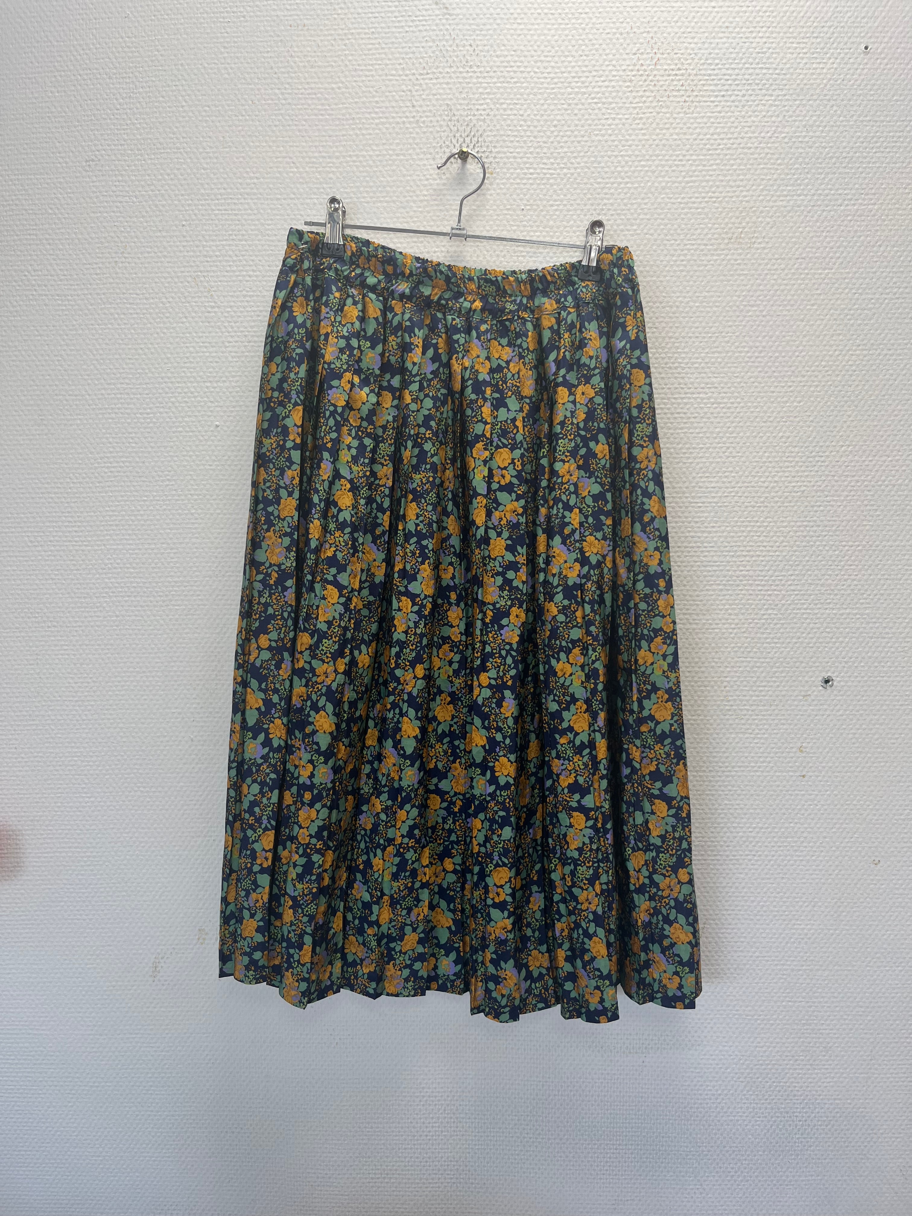 Jupe plissée à fleurs