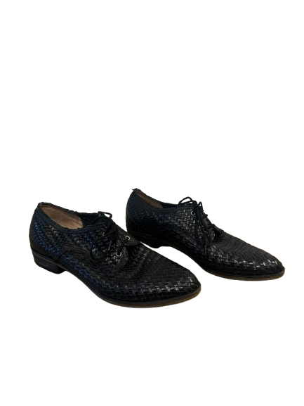 Chaussures en cuir tressé