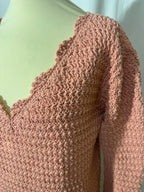 Pull ajourée rose