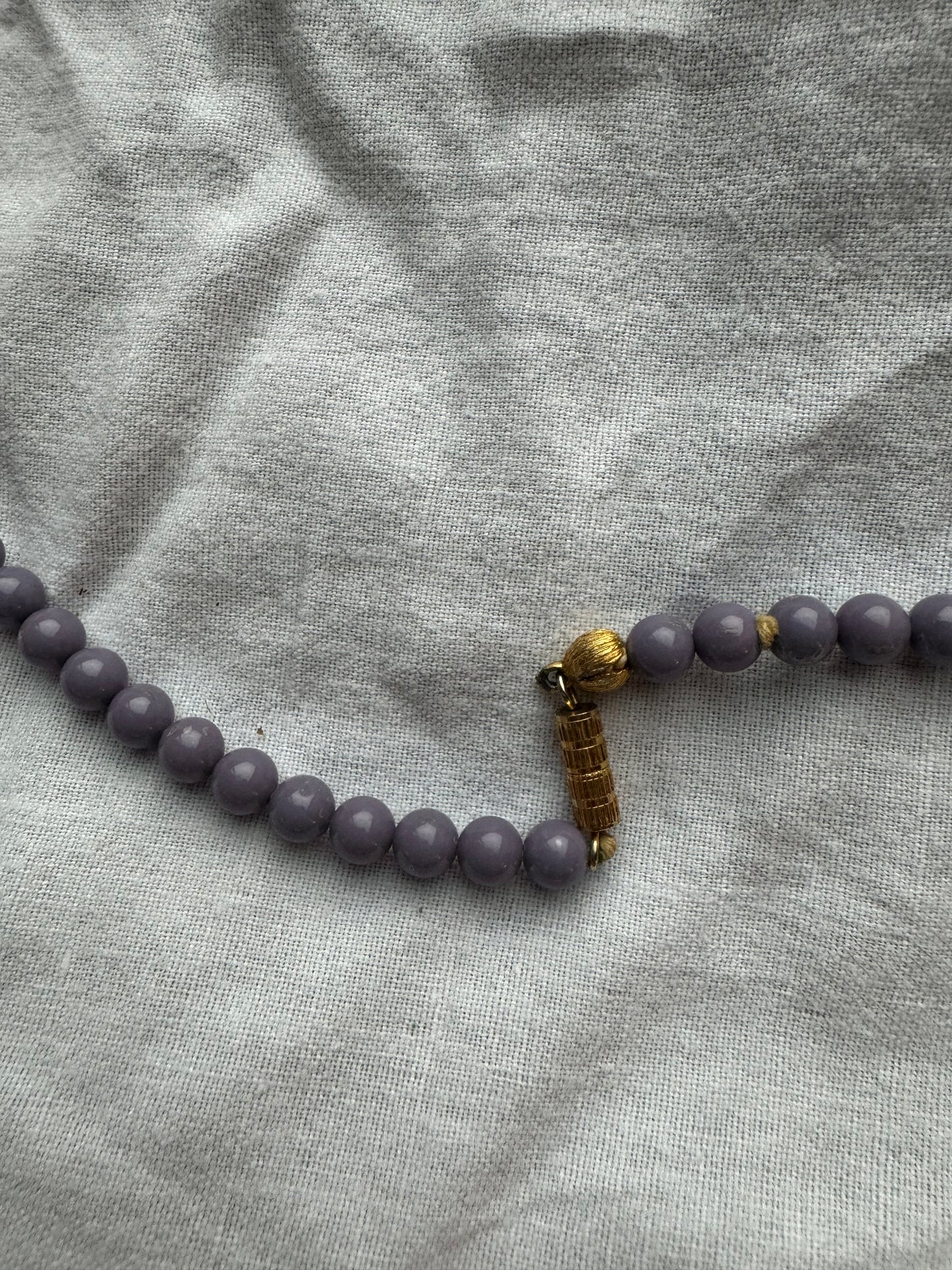 Collier perle violette