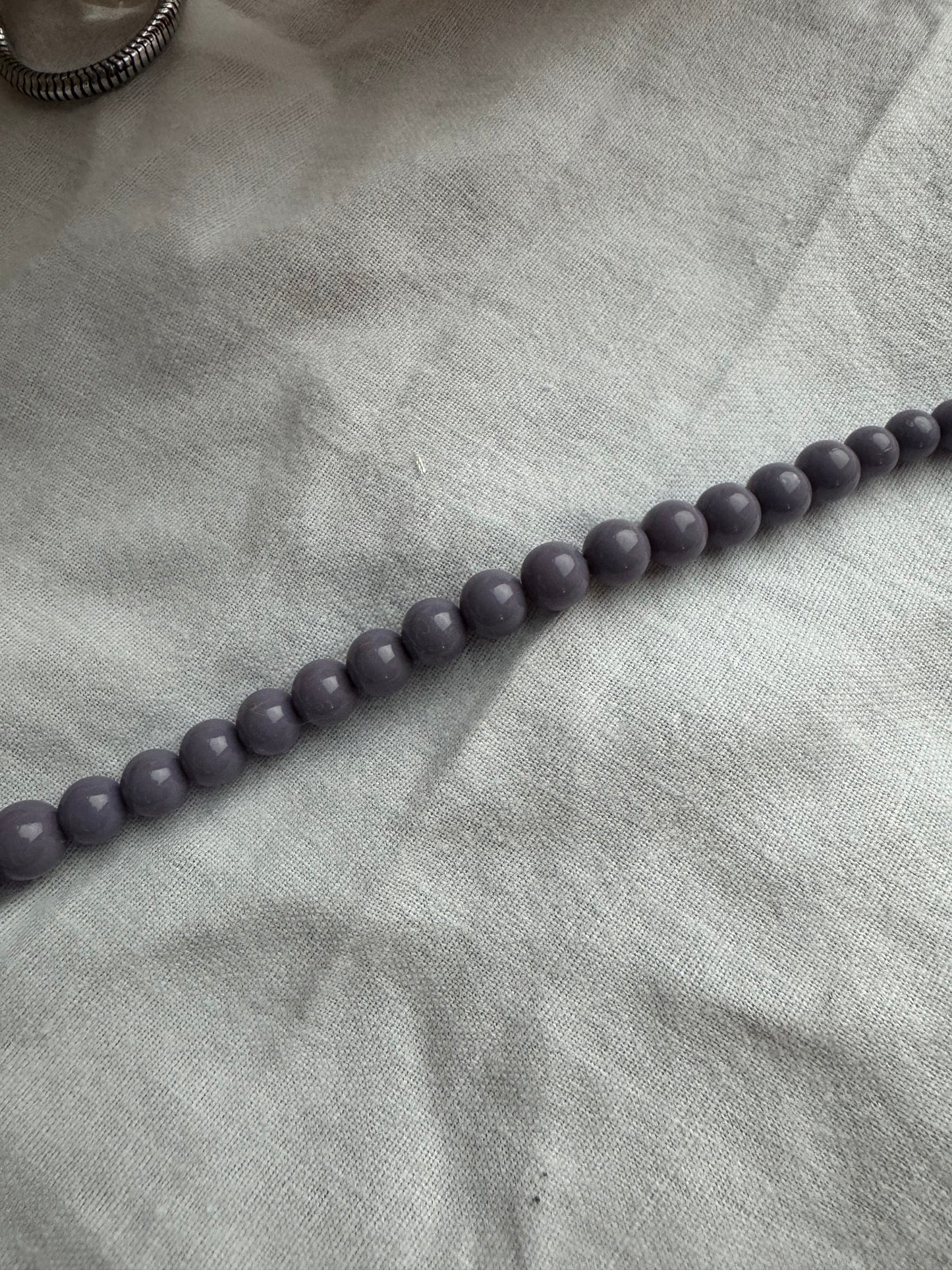 Collier perle violette