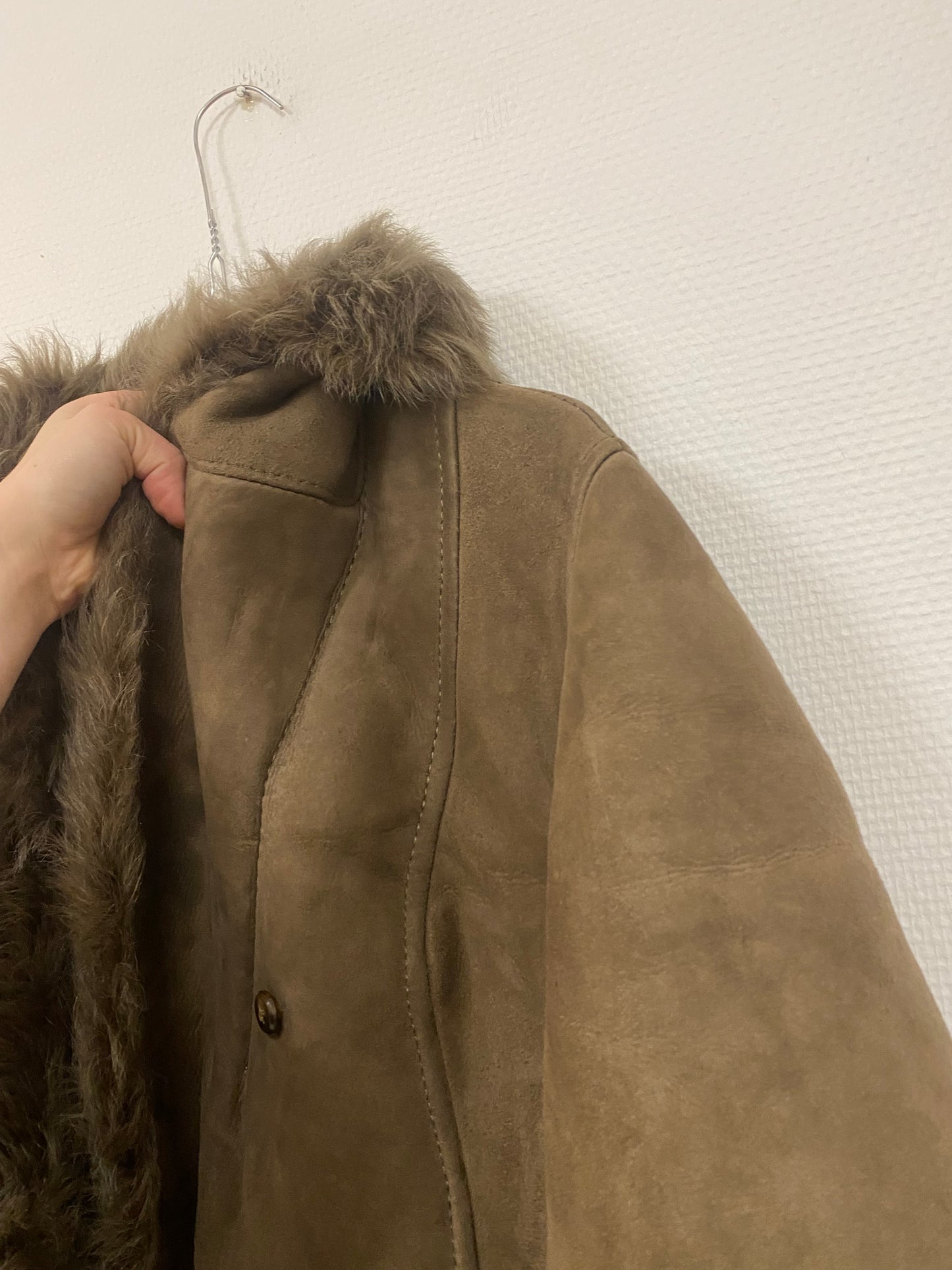 Manteau en peau lainée