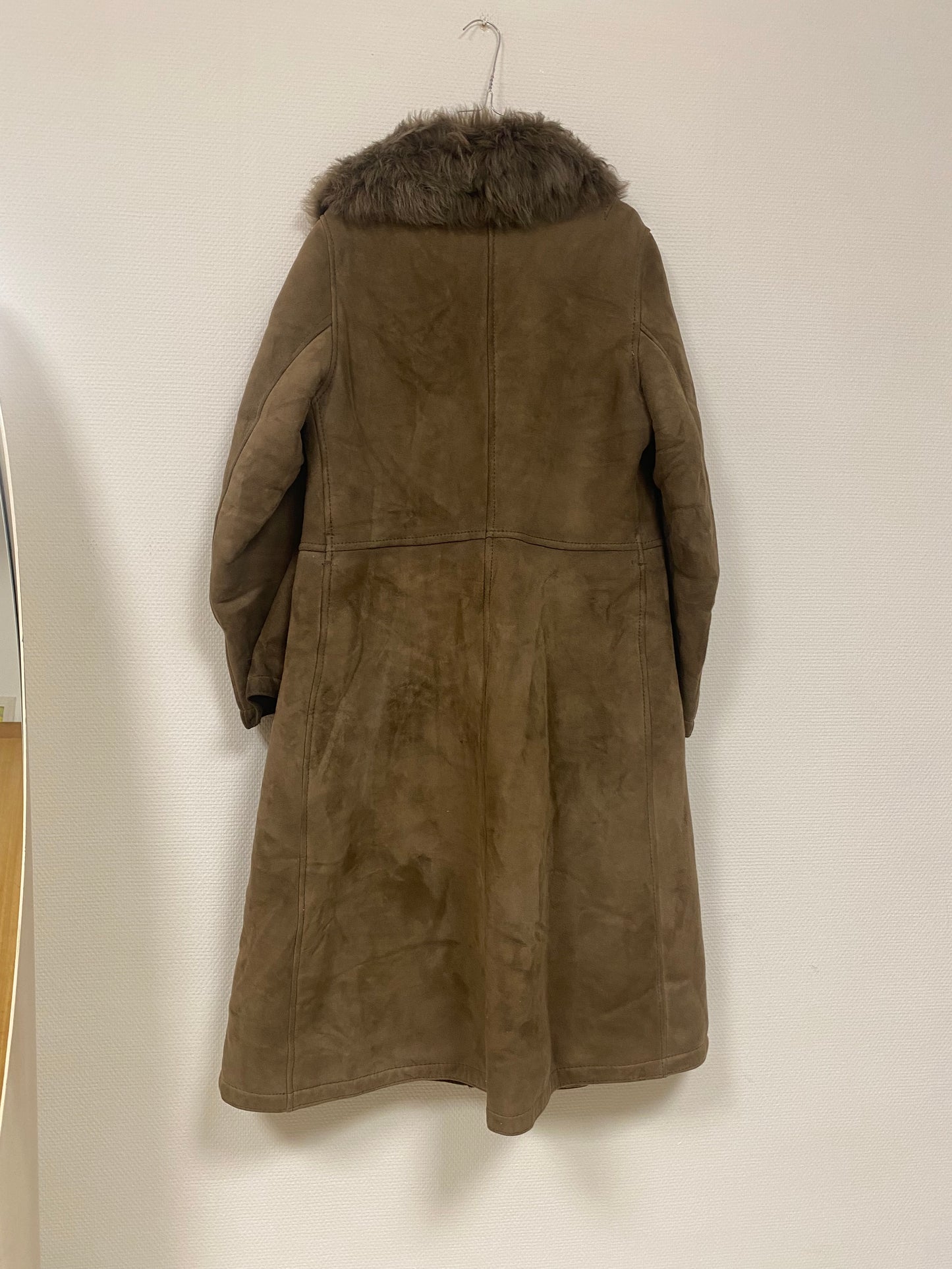 Manteau en peau lainée