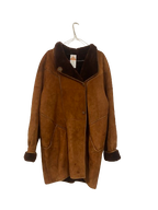 Manteau en peau lainée mi long