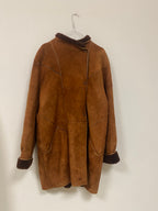 Manteau en peau lainée mi long