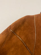 Manteau en peau lainée mi long