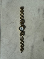 Montres en métal doré