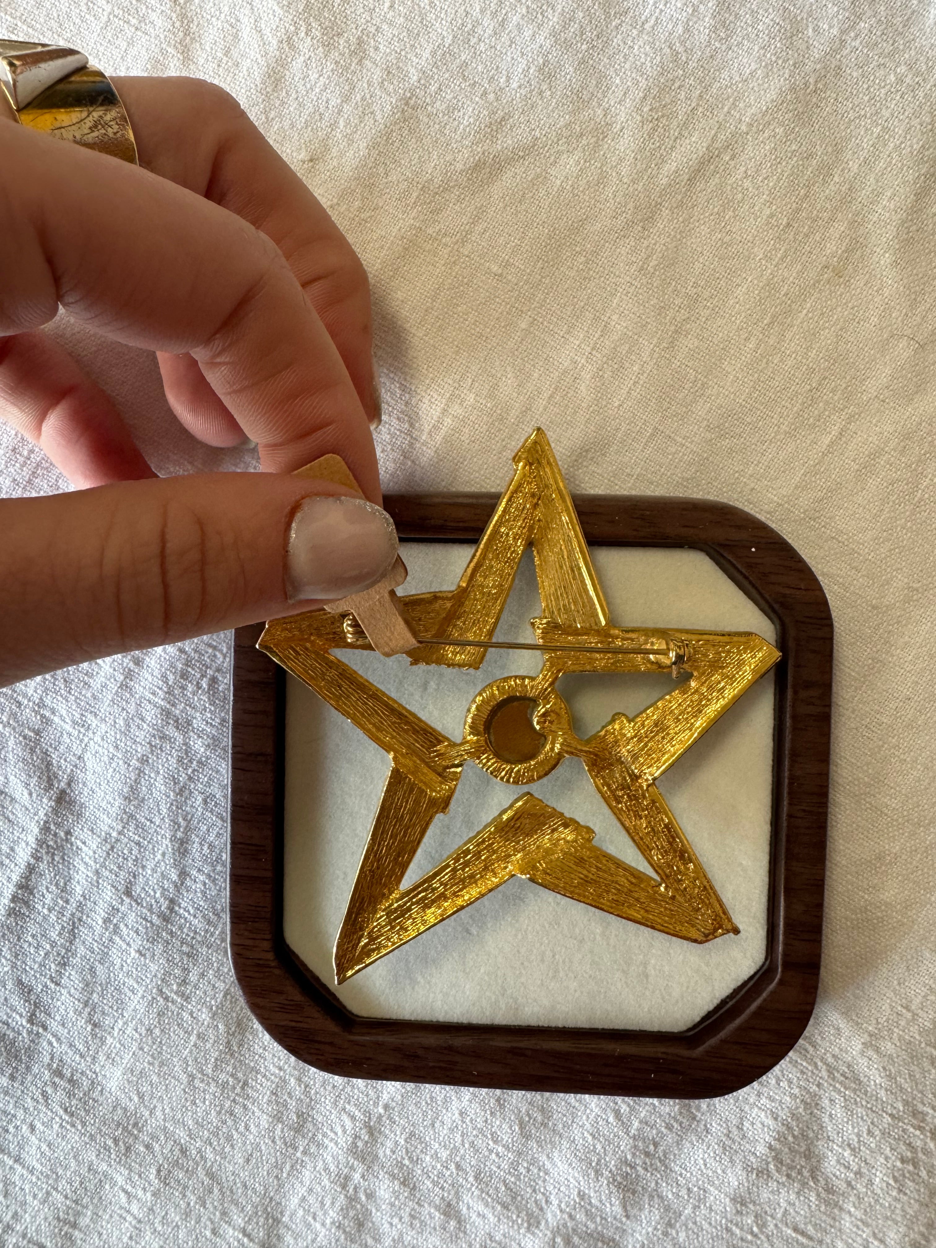Broche en métal étoile 80s